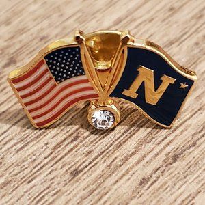 Pin of USA and Navy flags set in gold framing with diamond accent